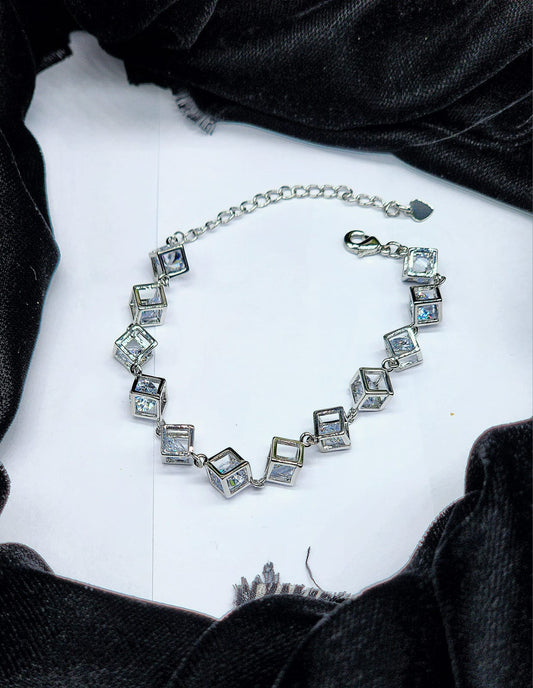 Silver-Toned Cubic Zirconia Link Bracelet.